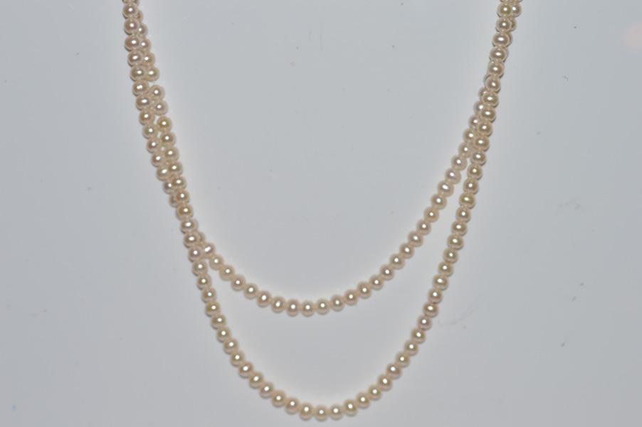 Appraisal: A ROPE LENGTH STRAND OF FRESHWATER PEARLS A ROPE LENGTH