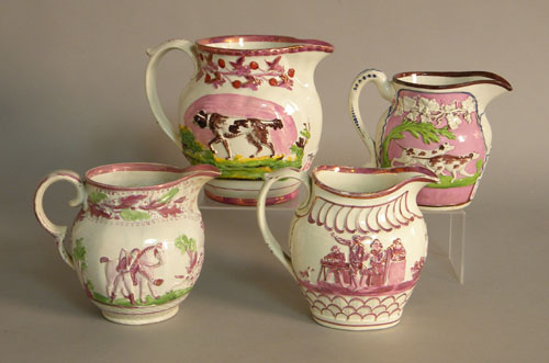 Appraisal: Four pink luster pitchers two with hunting dogs one with