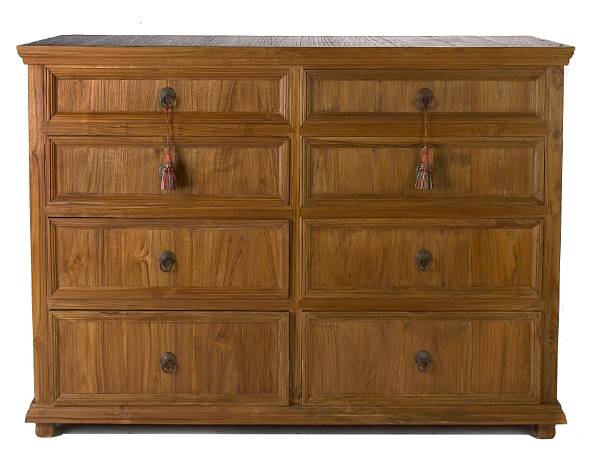 Appraisal: A Provincial mixed wood chest of eight drawers height in