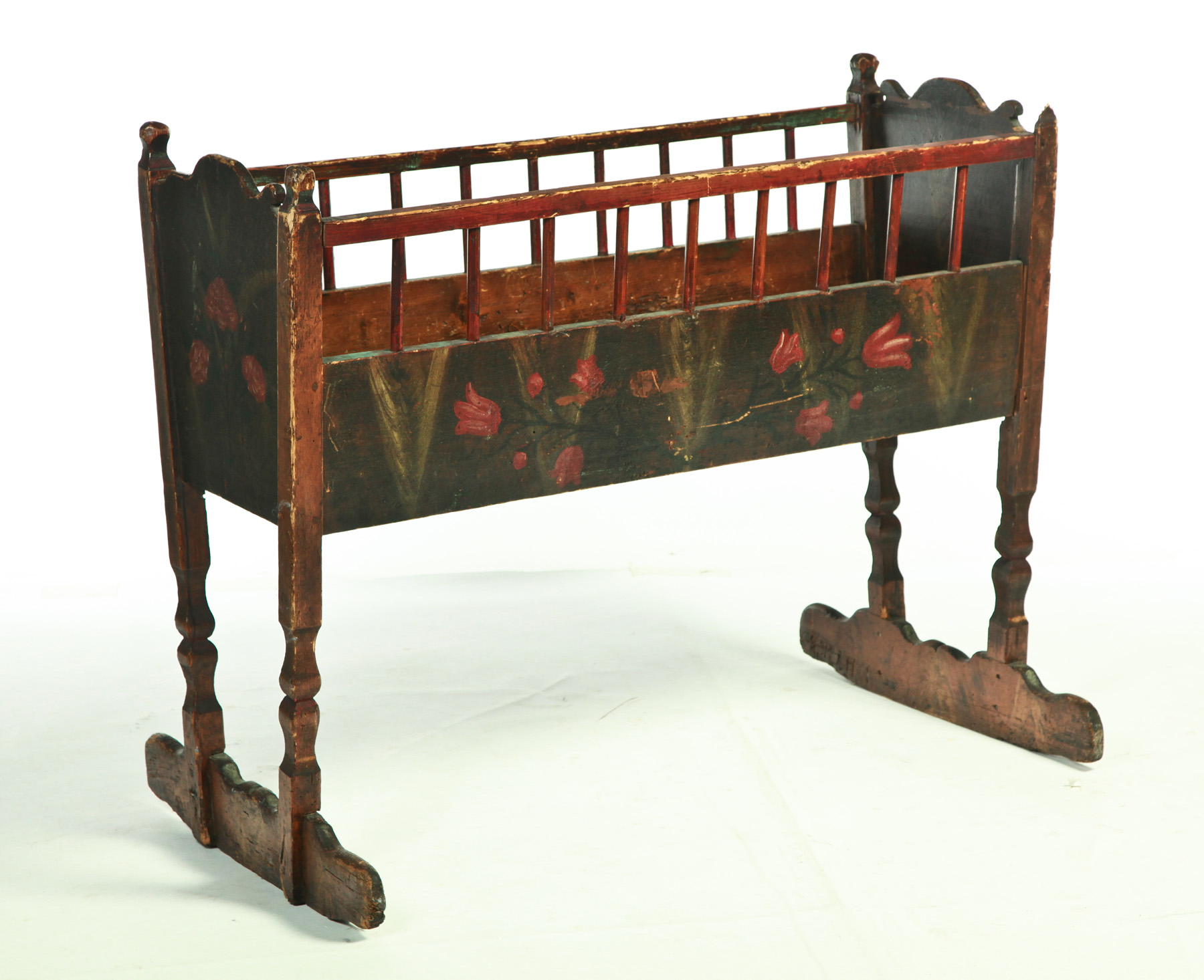 Appraisal: NORWEGIAN DECORATED CRADLE Nineteenth century pine Tall legs and scrolled