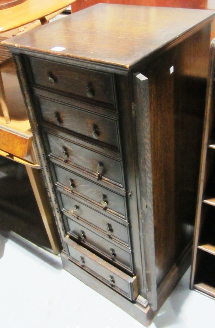 Appraisal: A th century oak seven drawer Wellington chest