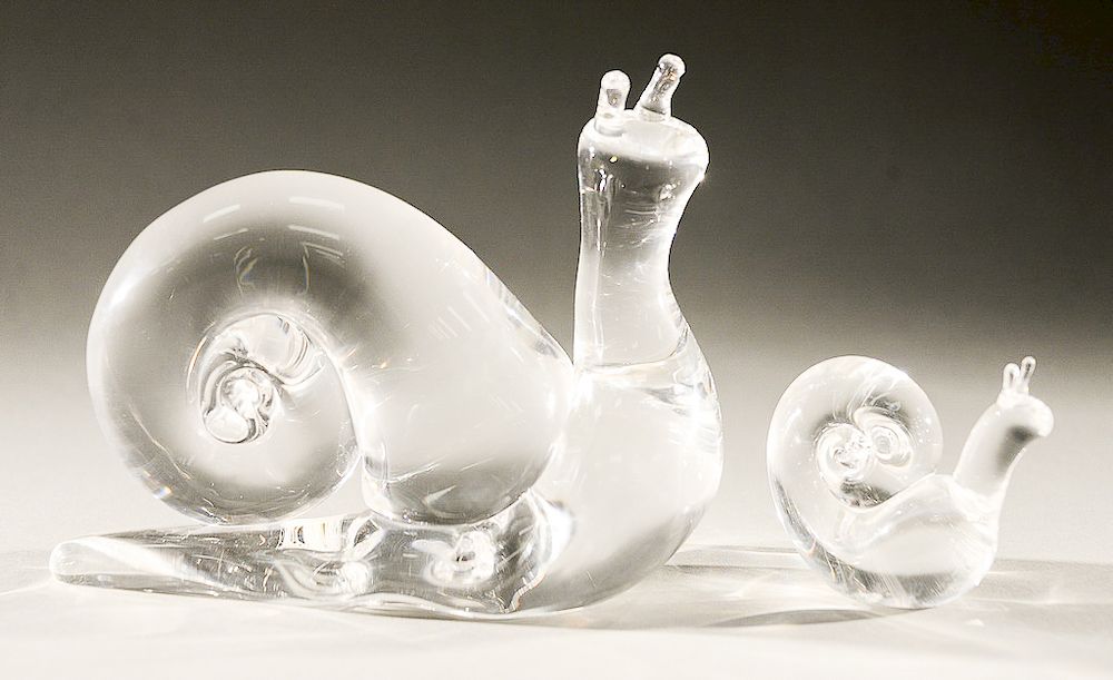 Appraisal: Two Steuben glass snails unusual large snail having backward curl