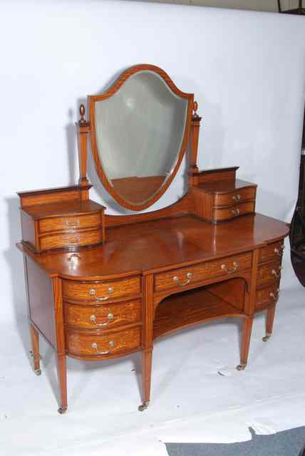 Appraisal: A LATE VICTORIAN EDWARDIAN SATINWOOD DRESSING TABLE by Gillows of