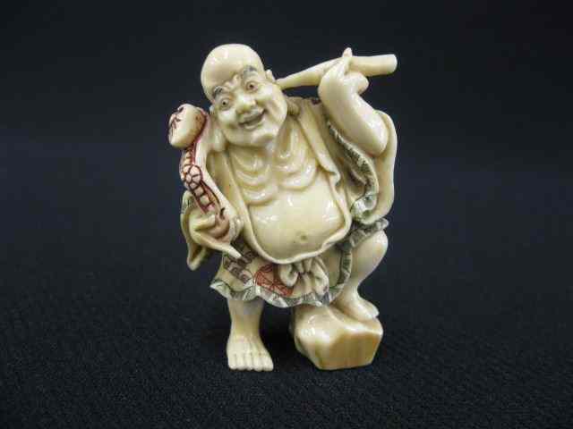 Appraisal: Carved Ivory Netsuke of Lohan cleaning his ear and holding