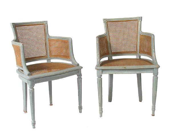 Appraisal: A pair of Directoire paint decorated and caned armchairs height