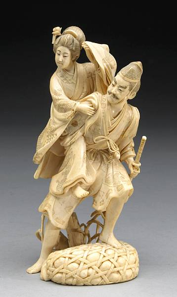 Appraisal: A carved and tinted ivory okimono of a warrior carrying