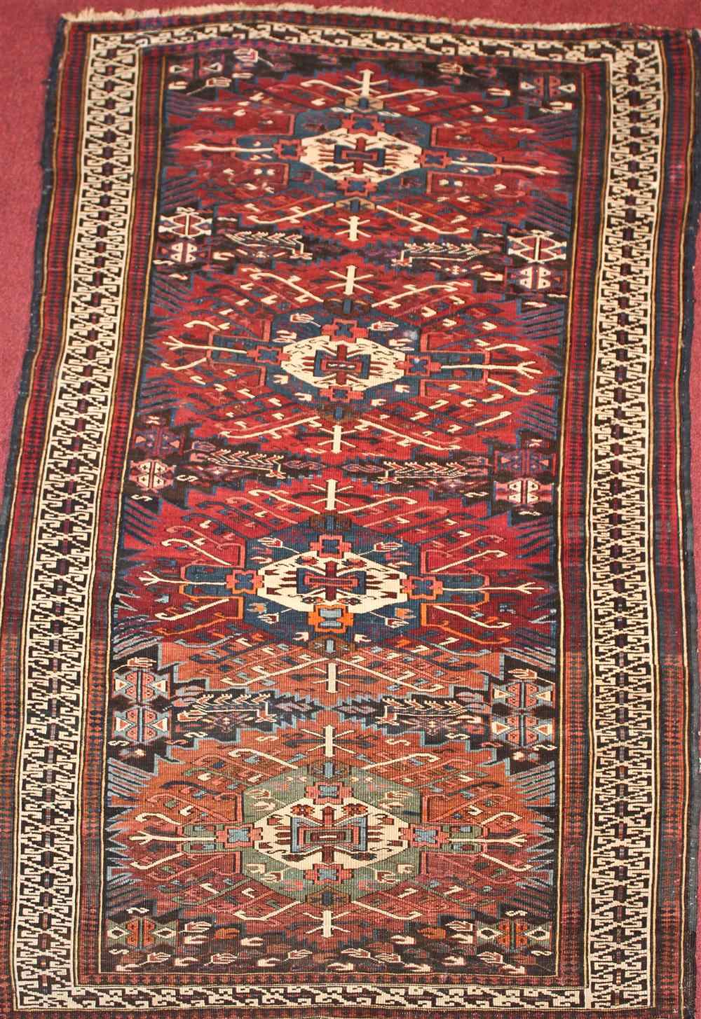 Appraisal: PERSIAN KUBA RUG approx ' '' x ' '' retail