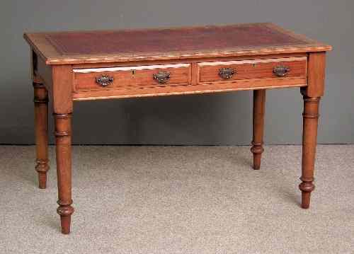 Appraisal: A Victorian mahogany writing table the top inset with gilt