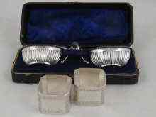 Appraisal: A pair of boxed silver salts with spoons marked Chester