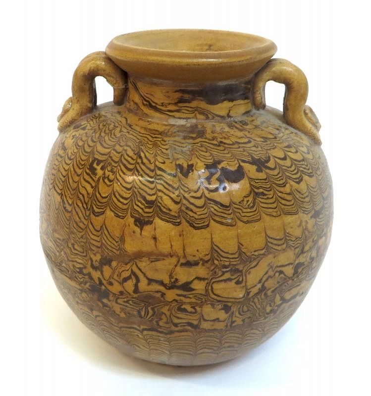 Appraisal: Tang Style Jar Tang Style Jar Description Brownish yellow glaze