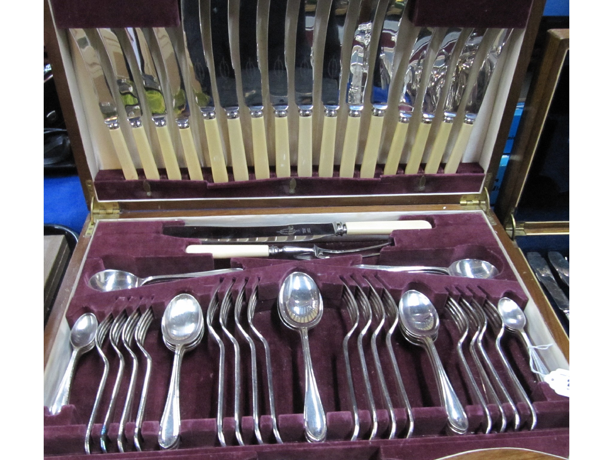 Appraisal: A walnut canteen of EPNS cutlery eight settings