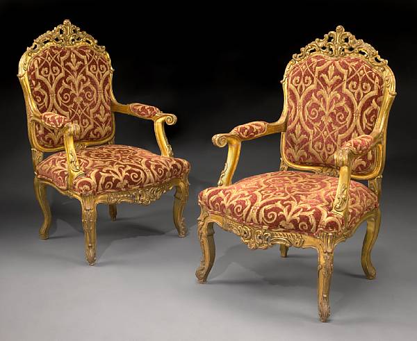 Appraisal: A pair of Louis XV style carved giltwood fauteuils th