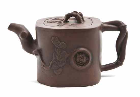 Appraisal: A Chinese Yixing Teapot having a branch form finial and