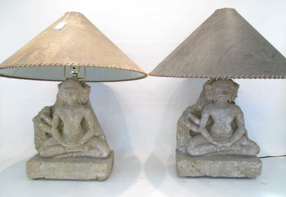 Appraisal: PAIR SAND MOLDED FIGURAL TABLE LAMPS depicting a seated three-headed