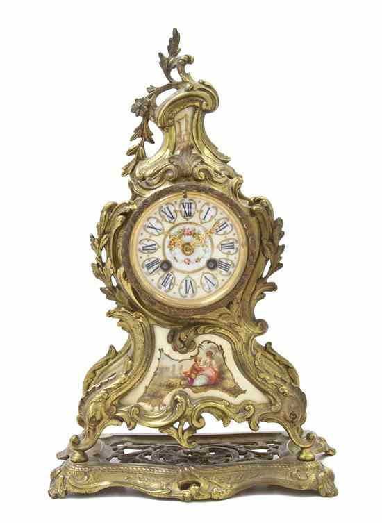 Appraisal: A French Gilt Bronze and Porcelain Inset Mantel Clock having