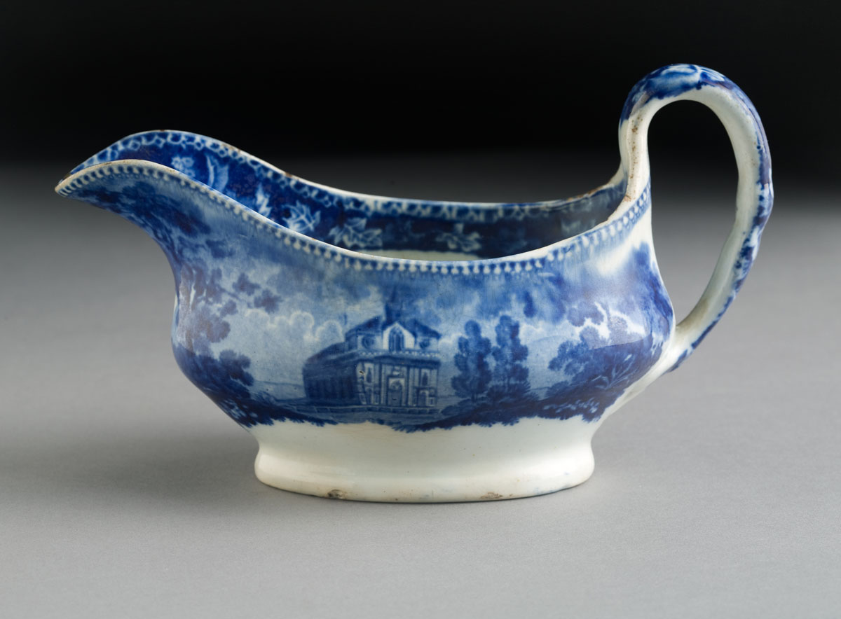 Appraisal: CATHOLIC CATHEDRAL NEW YORK DARK-BLUE STAFFORDSHIRE SAUCEBOAT RALPH STEVENSON WILLIAMS