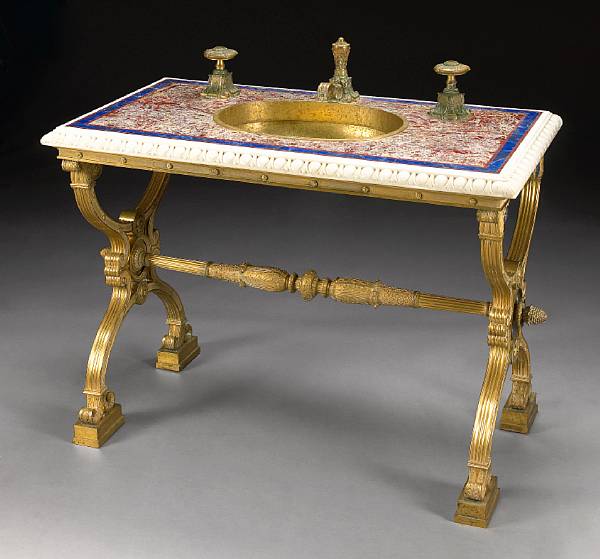 Appraisal: An Empire style gilt bronze and marble sink th century