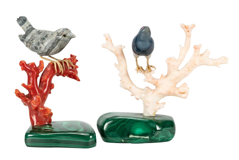 Appraisal: TWO CARVED STONE BIRDSsitting on a malachite base and coral