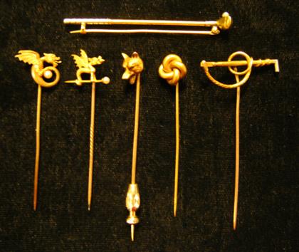 Appraisal: Gold tone stick pins and tie bar th century