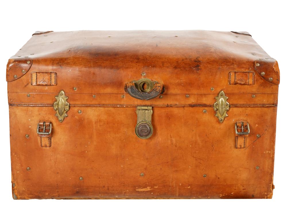 Appraisal: ANTIQUE LEATHER-CLAD TRUNKthe domed hinged lid opening to a fabric-lined