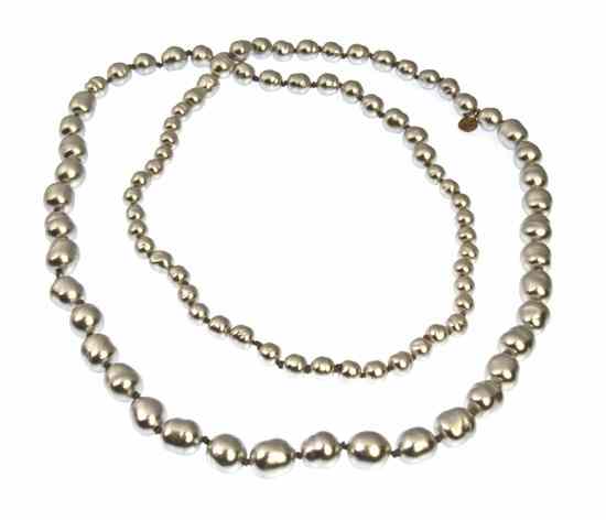 Appraisal: A Chanel Silver Faux Baroque Pearl Rope Necklace Stamped Chanel