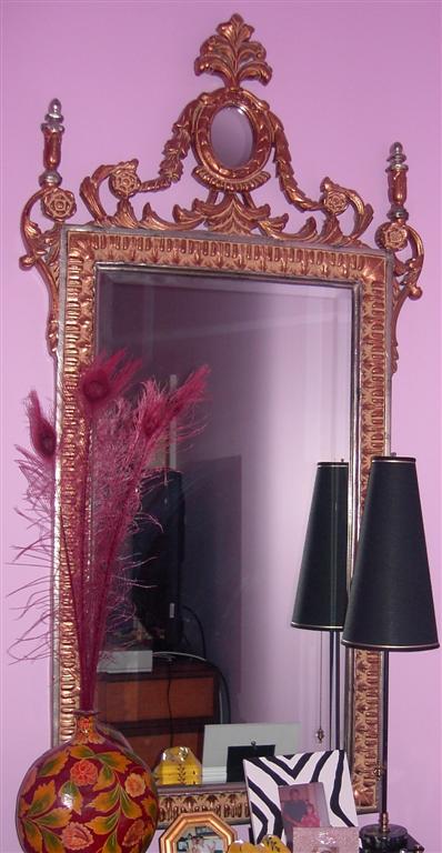 Appraisal: NEOCLASSICAL STYLE GILTWOOD MIRROR The crest with small oval mirror