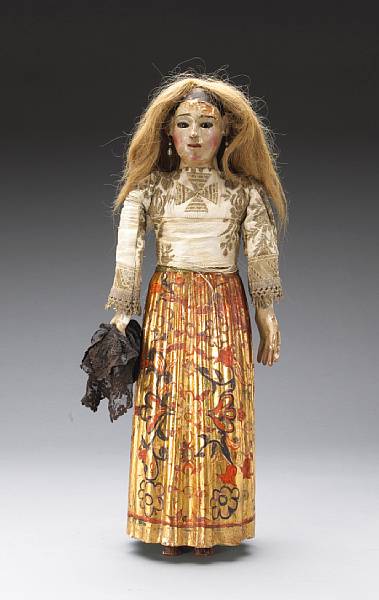 Appraisal: A Spanish colonial polychrome wood figure of the Virgin th