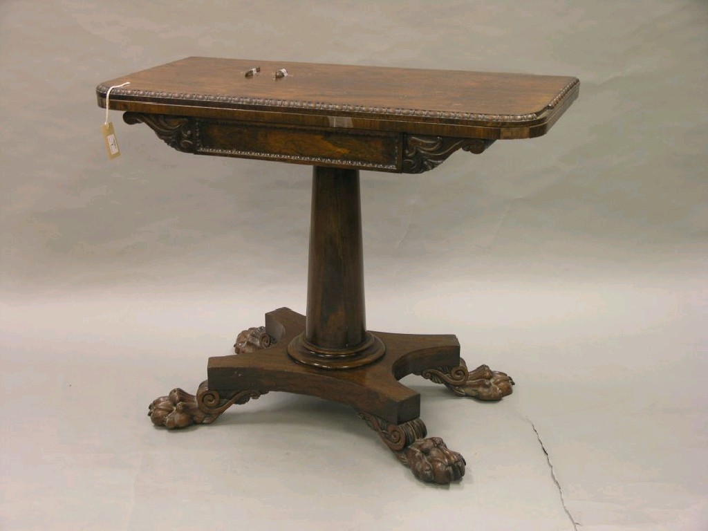 Appraisal: A William IV rosewood card table D-shaped top with bead-and-billet