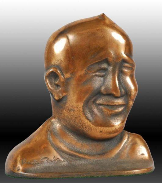 Appraisal: Knute K Rockne Cast Iron Doorstop Description Made by Creations