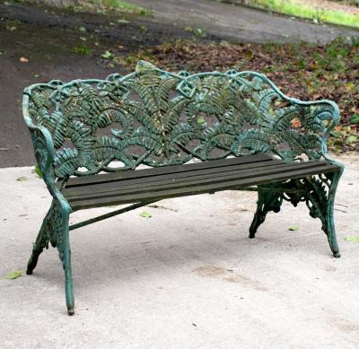 Appraisal: A Coalbrookdale cast iron fern pattern garden chair with slatted