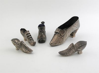 Appraisal: Five various shoes a large late Victorian shoe with a