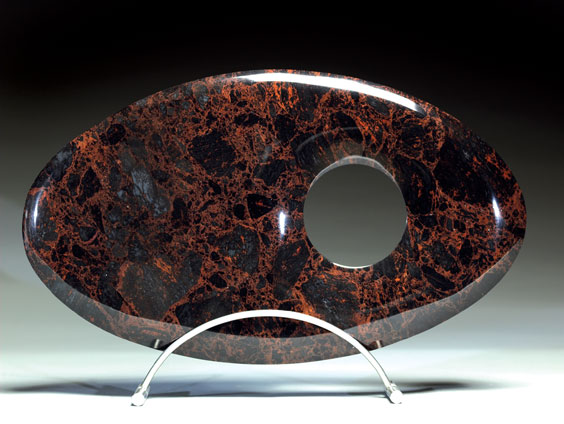 Appraisal: DECORATIVE POLISHED MAHOGANY OBSIDIAN SCULPTURE Chihuahua Mexico Although obsidian normally