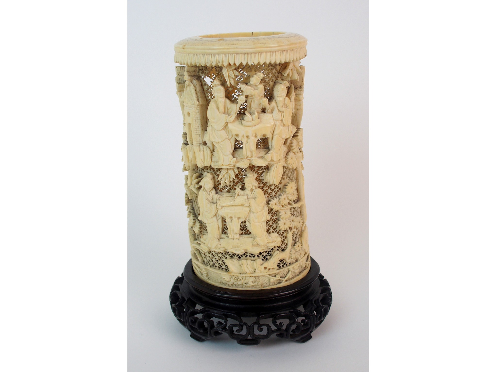 Appraisal: A Cantonese ivory tuskpierced and carved with figures at tables