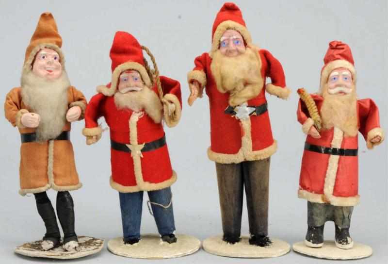 Appraisal: Lot of Santas with Composition Faces Japanese Condition Excellent Size