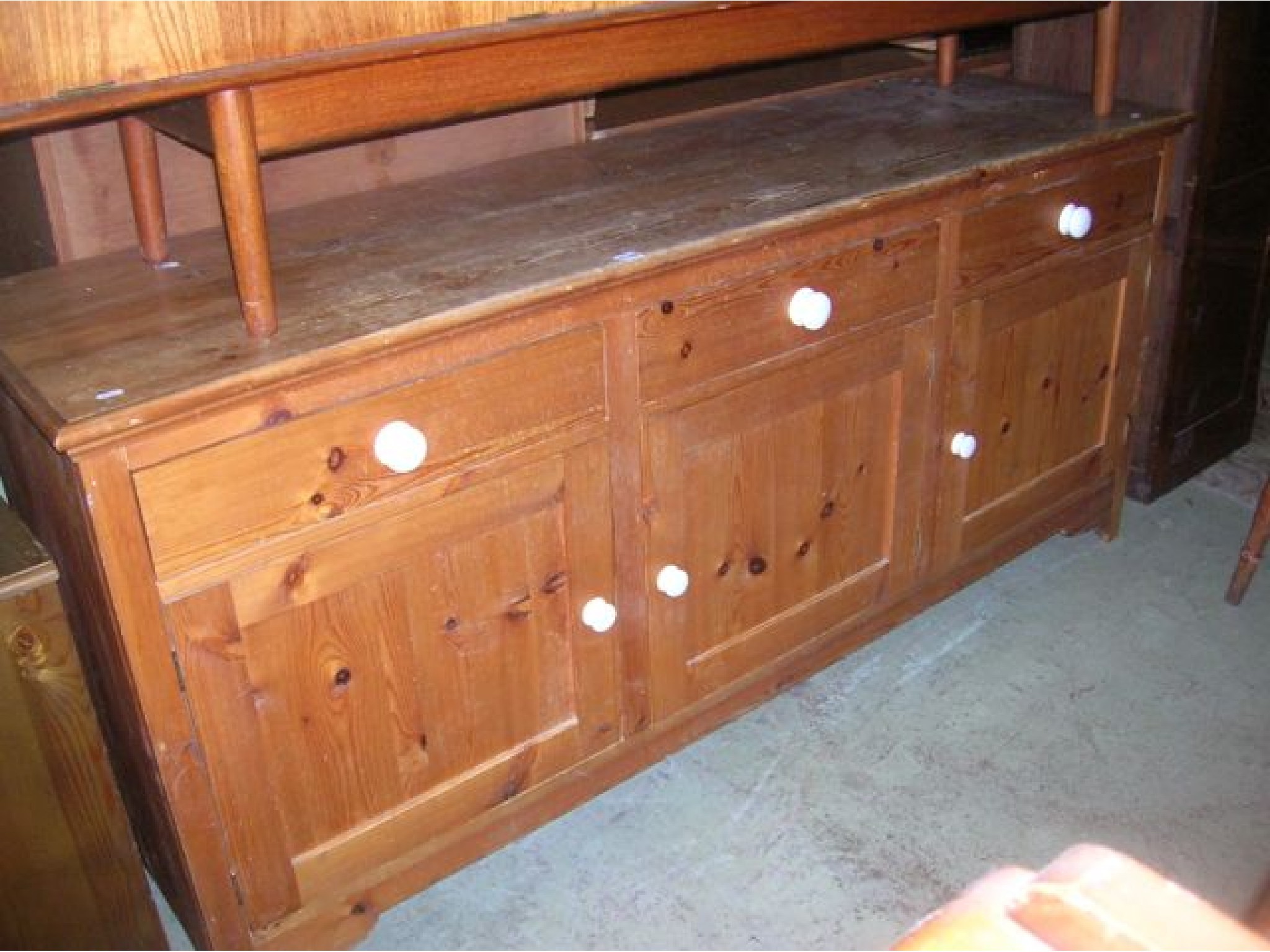 Appraisal: A Victorian style stripped pine kitchen dresser base enclosed by