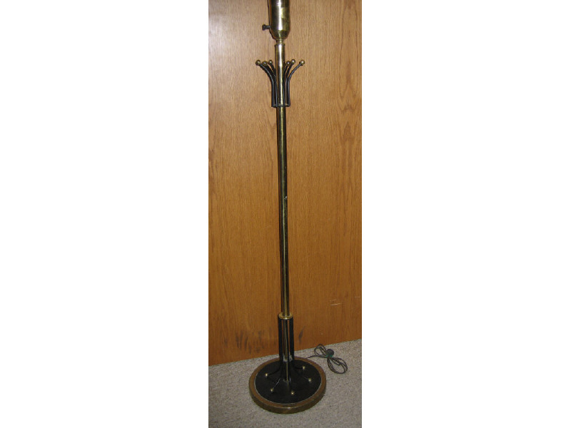 Appraisal: AMERICAN MID-CENTURY FLOOR LAMP Brass tone with black metal rod