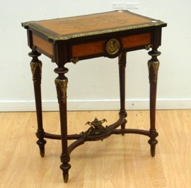 Appraisal: An early th century Louis XV style satinwood marquetry inlaid