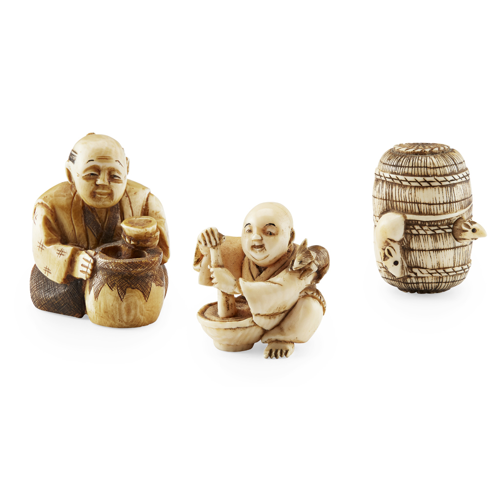 Appraisal: YTHREE IVORY NETSUKE the first a karakuri netsuke of two