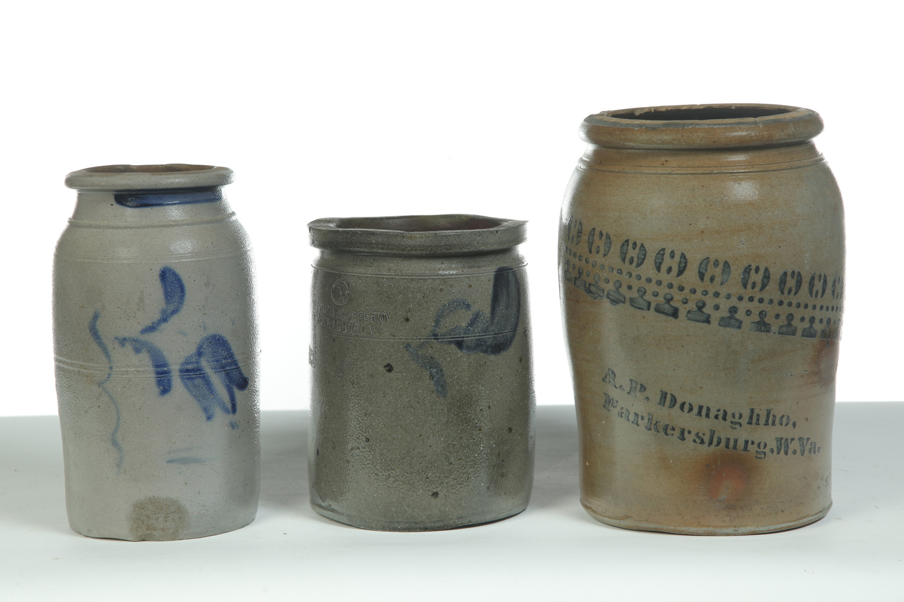 Appraisal: THREE STONEWARE JARS WITH COBALT DECORATION American nd half- th