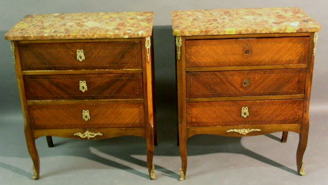 Appraisal: Pair of French walnut three-drawer commodes early thc with marble