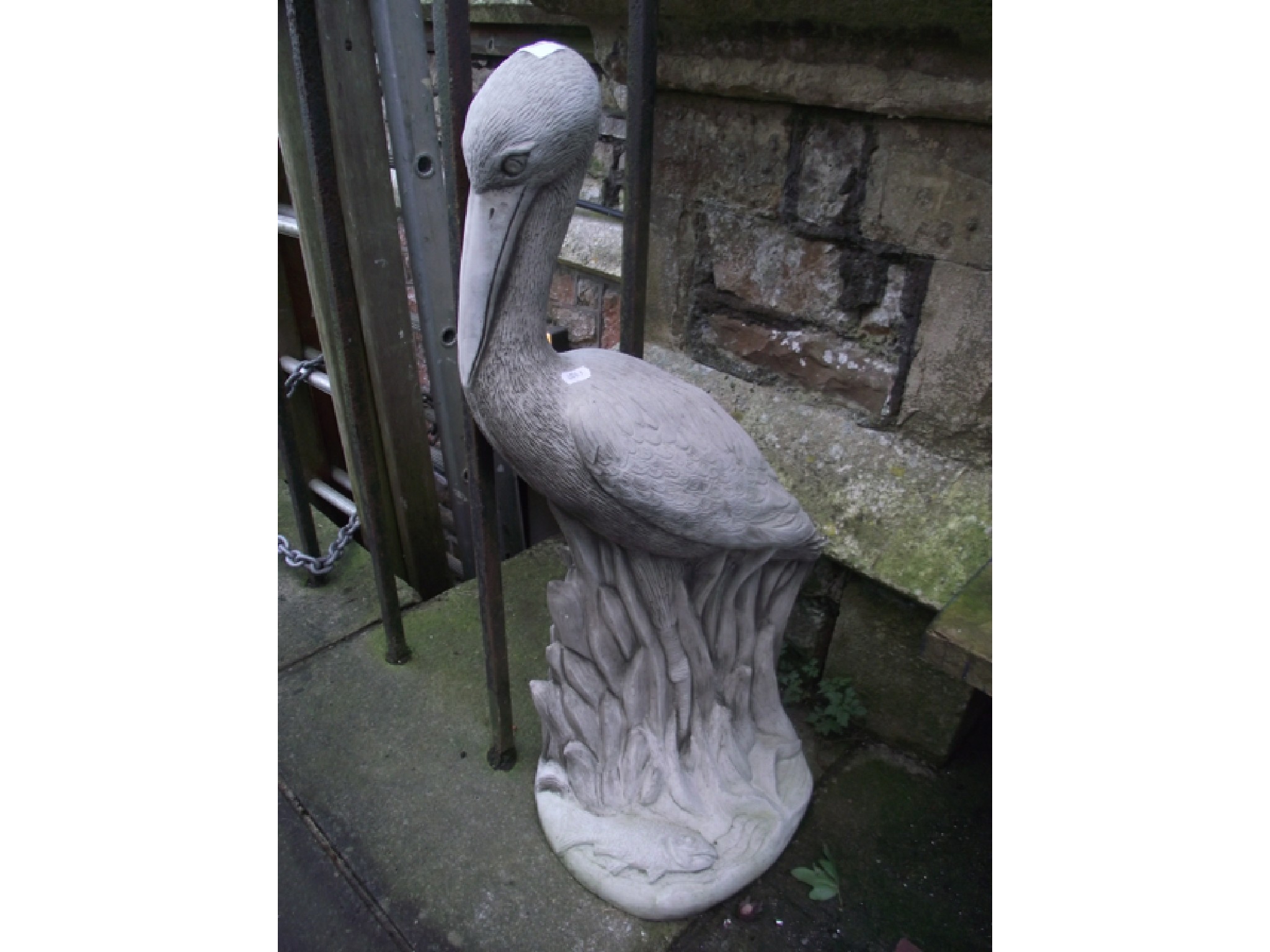 Appraisal: A cast composition stone garden ornament in the form of