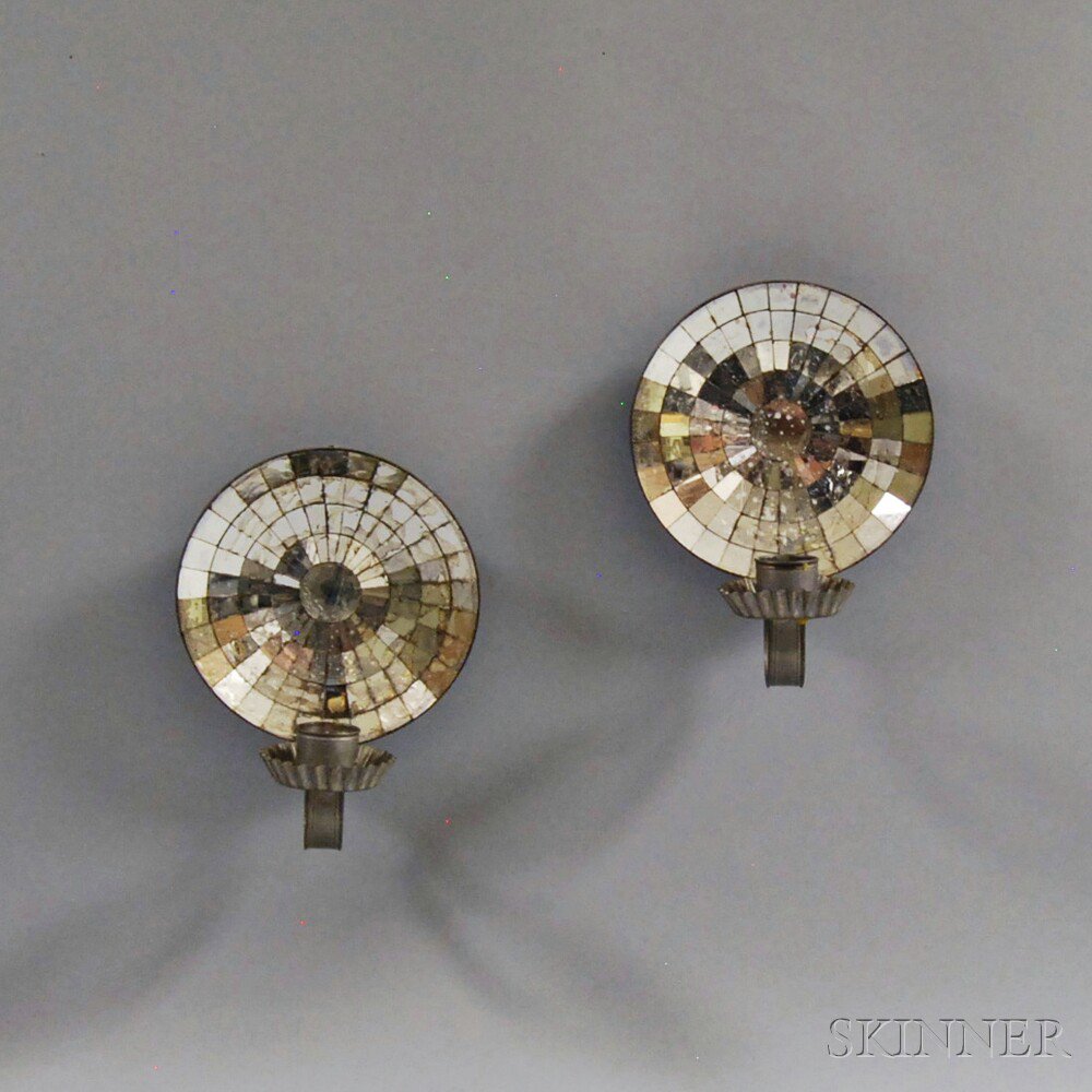 Appraisal: Pair of Mirrored Tin Sconces th century the concave mirrored