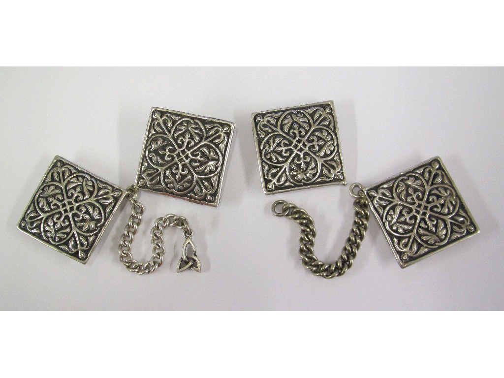 Appraisal: Iain McCormick a two piece silver cloak clasp set and