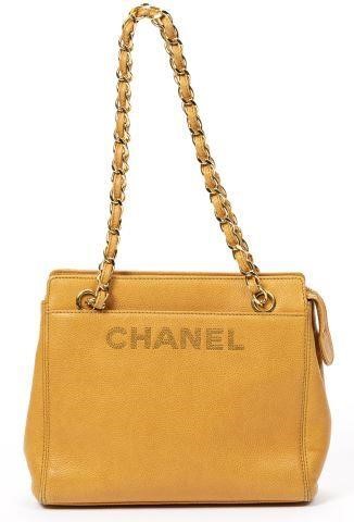 Appraisal: Chanel caviar leather handbag with gold-toned hardware two interlaced gold-toned