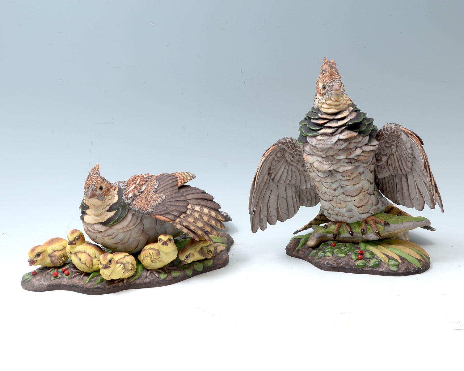 Appraisal: PAIR OF BOEHM PORCELAIN RUFFED GROUSE Handsome beautifully detailed male