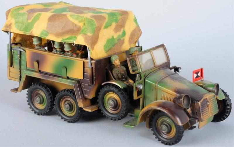 Appraisal: Hausser Tinplate Krupp Military Vehicle Clockwork is working Electric lights