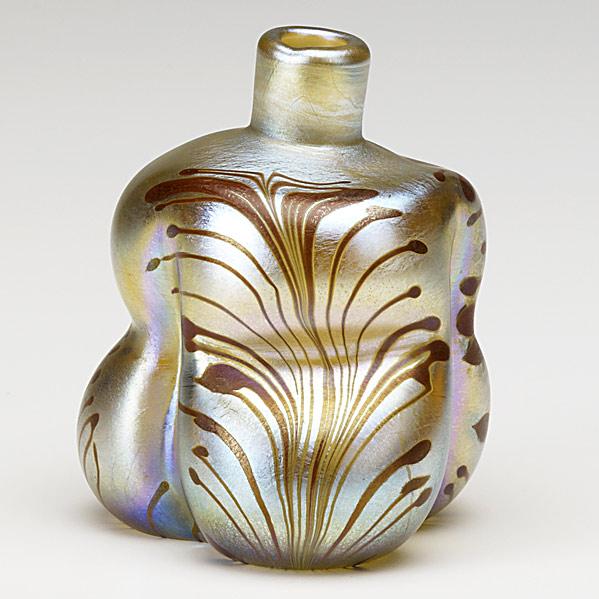 Appraisal: TIFFANY STUDIOSGold Favrile lobed bottle with feather motifEtched Louis C