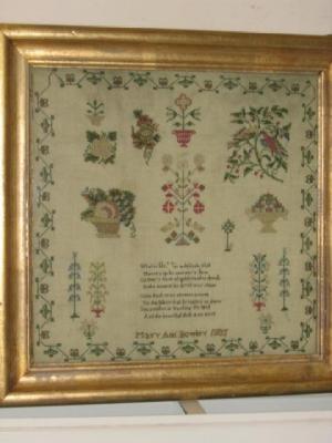 Appraisal: A NEEDLEWORK SAMPLER worked by Mary Ann Bowley with groups