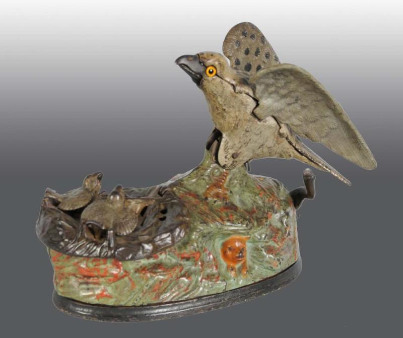 Appraisal: Cast Iron Eagle Eaglets Mechanical Bank Description Manufactured by J