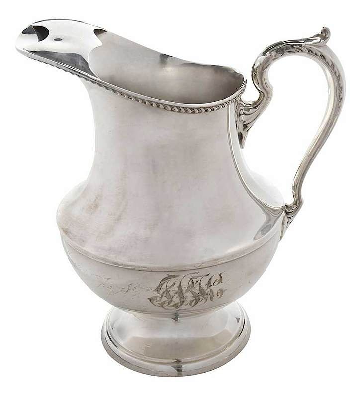 Appraisal: Sterling Water Pitcher American th century urn form scroll handle